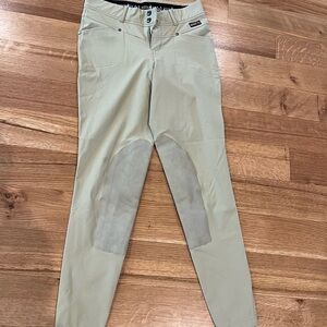 Kerrits, Size M, Beige Riding Pants with Knee Patches. Good condition.